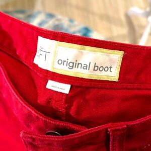 Never worn, boot cut, maroon color